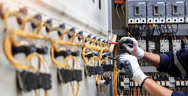 Professional Electrician technician working in Cockrell Hill, TX